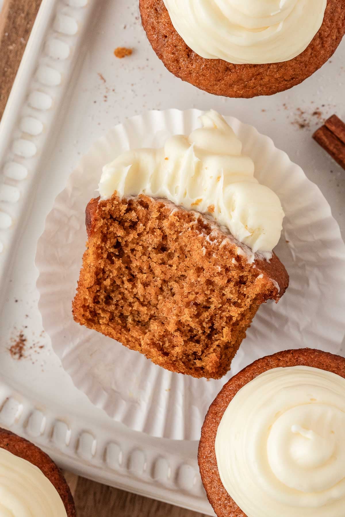 close up of interior of a moist cupcake with frosting