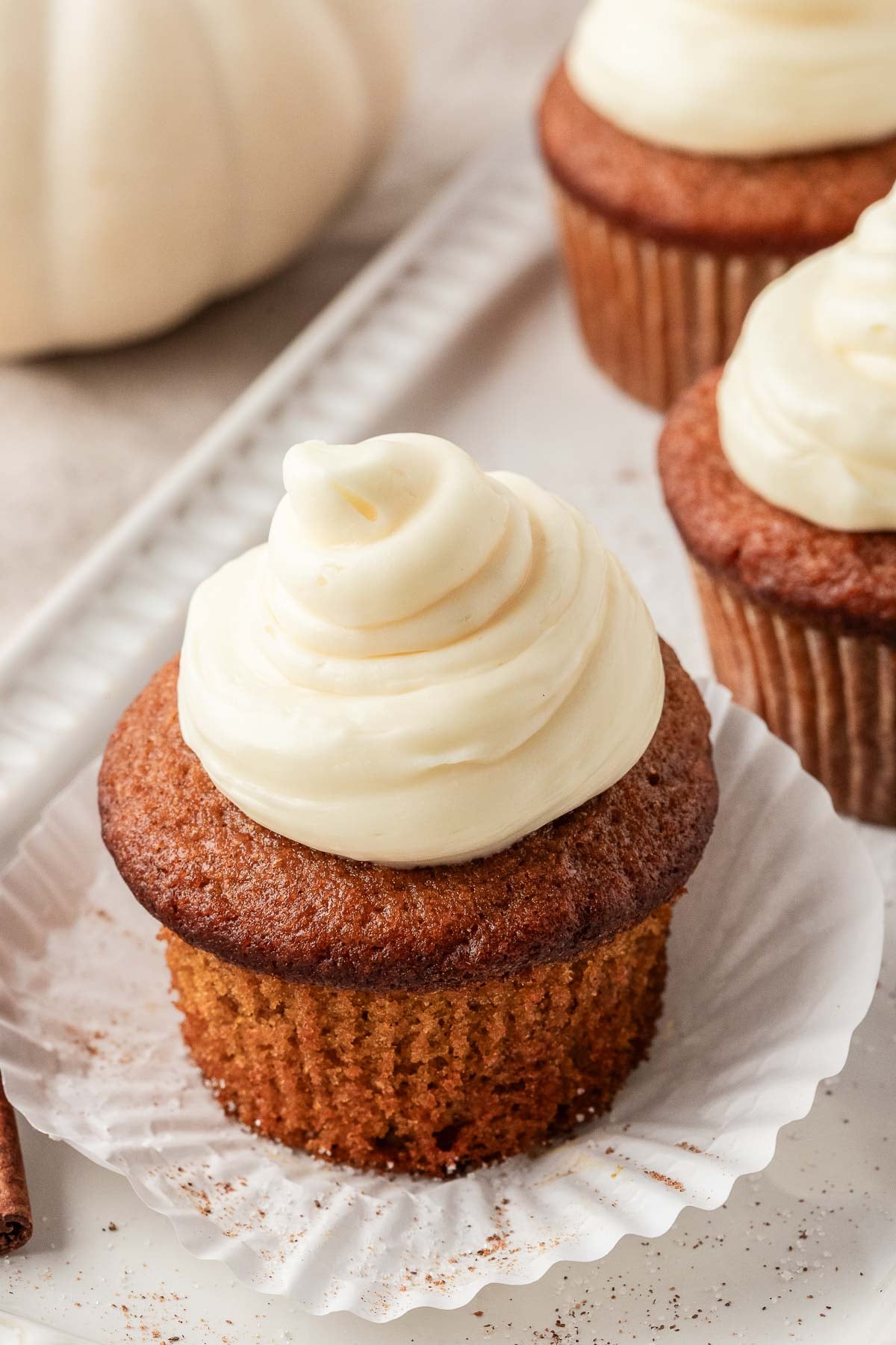 pumpkin cupcakes with frosting