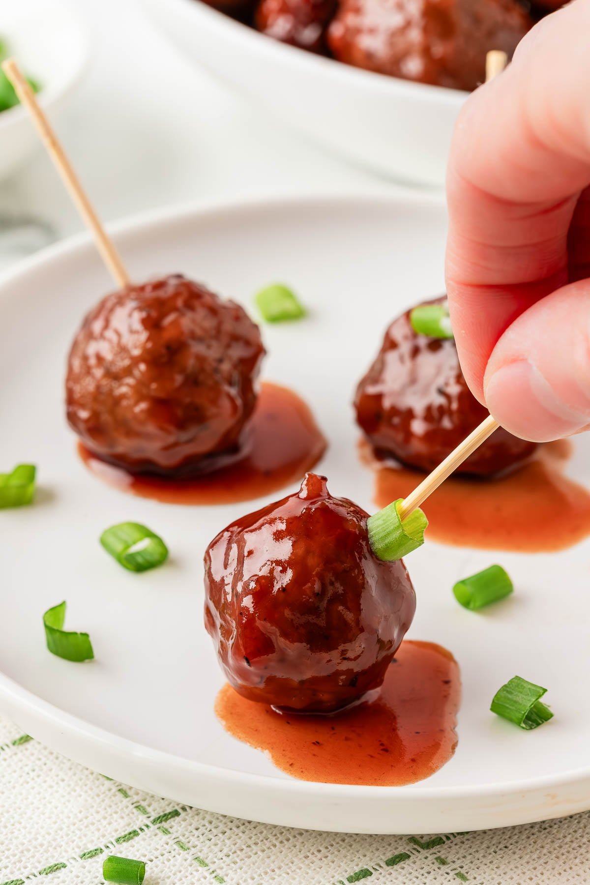 close up of meatball on a toothpic