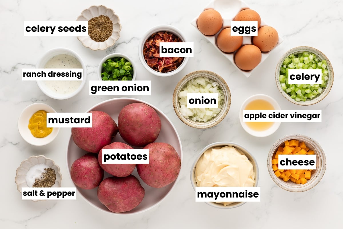 ingredients on a table for making a summer potluck salad