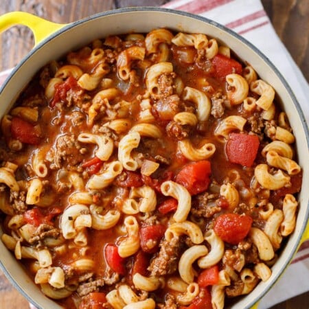 Old fashioned goulash recipe with ground beef, macaroni, and cheddar cheese