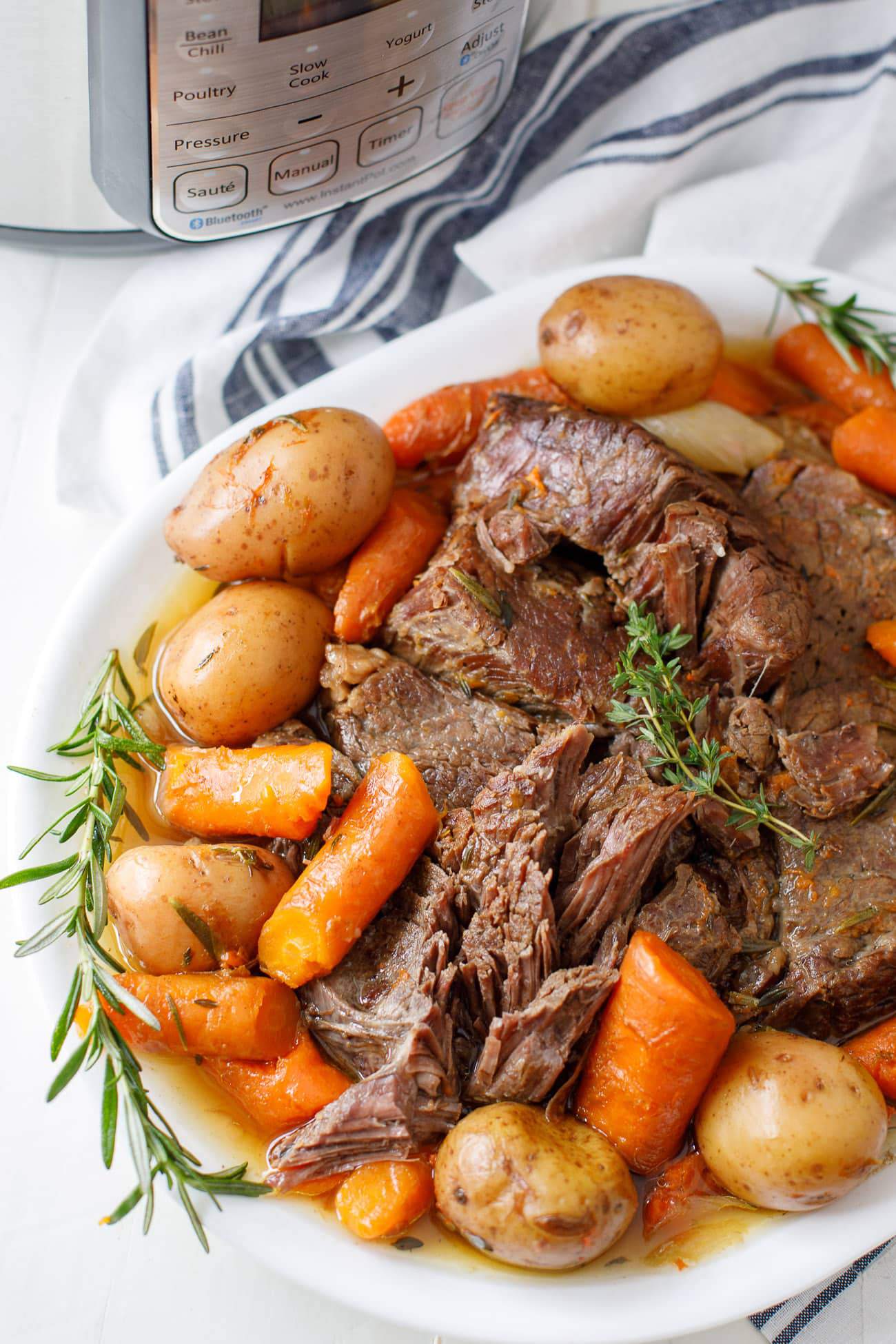 Enjoy roast & carrots w/ this 7-Qt. Crock-Pot slow cooker at just