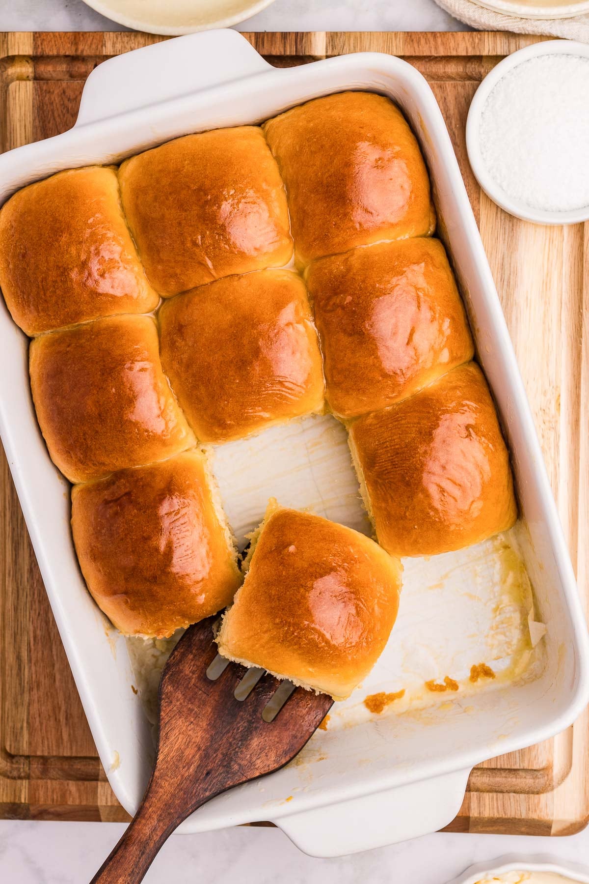 honey butter dinner rolls in a dish