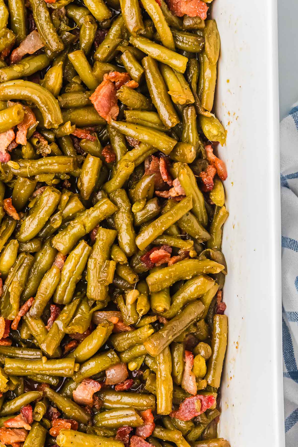Canned Green Beans Recipe served in a 9x13 dish with glossy sweet and savory coating