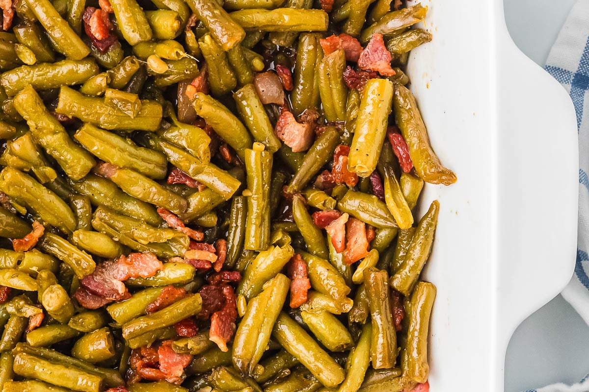 baking dish with glossy vegetable bake and bacon