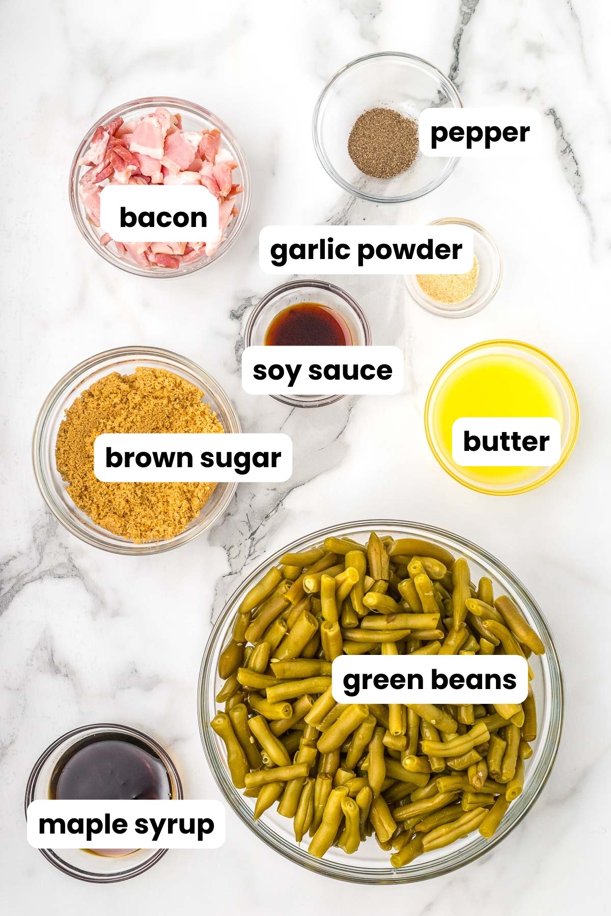 ingredients in pinch dishes laid out on a table for making a recipe