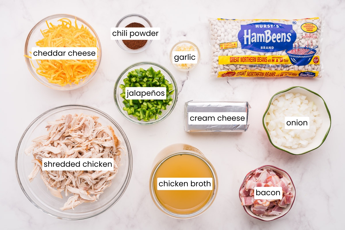ingredients for a hearty bean soup on a table
