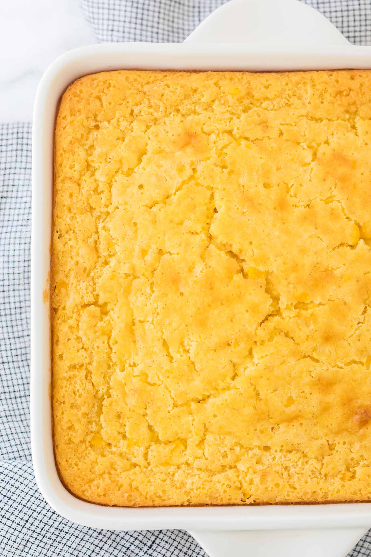 Classic Jiffy Cornbread Casserole served warm at a family meal