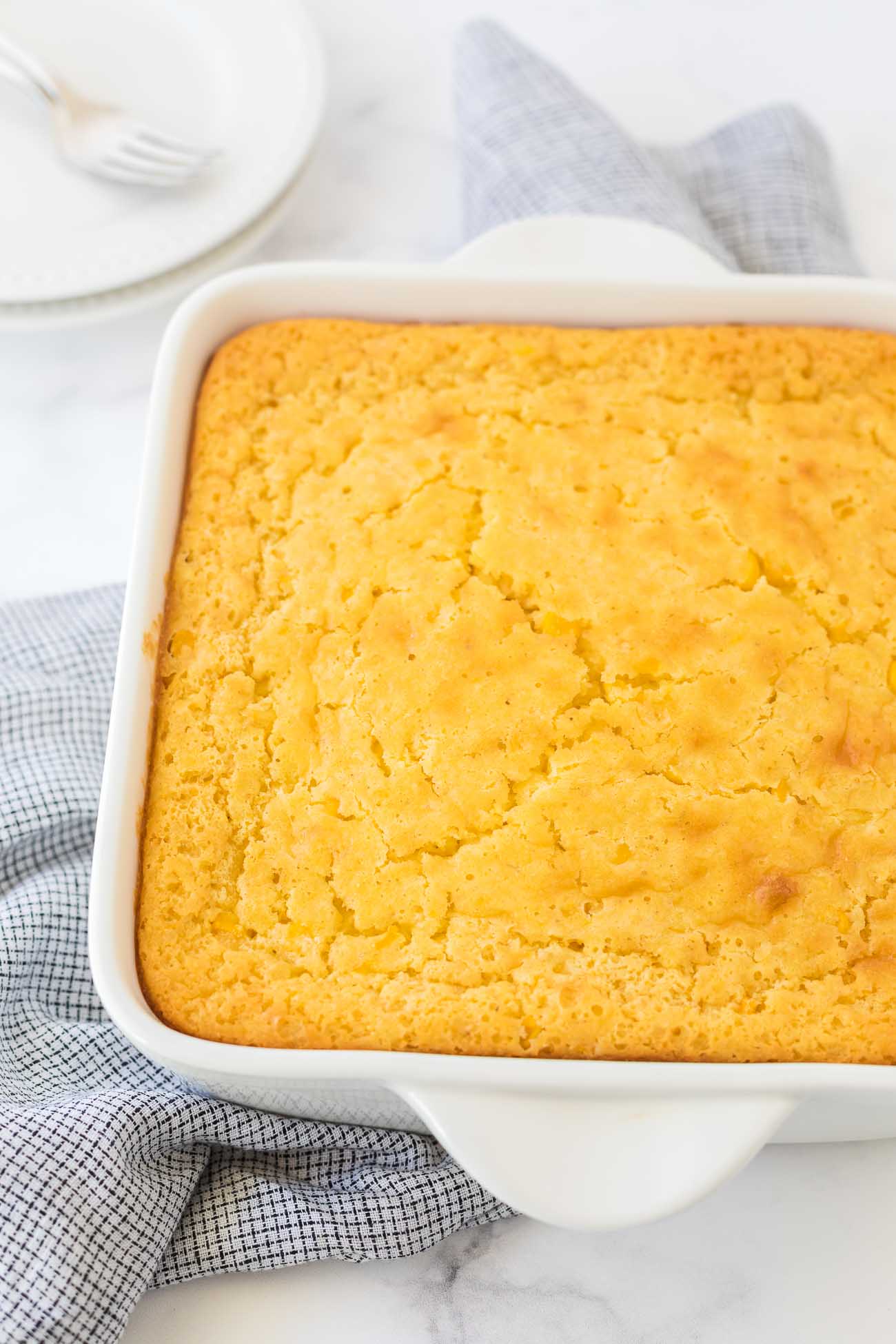 Close-up of the best Jiffy Corn Casserole with sweet corn and sour cream