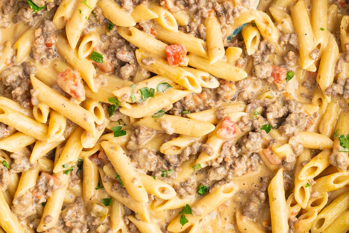 macro of cheesy penna pasta meal