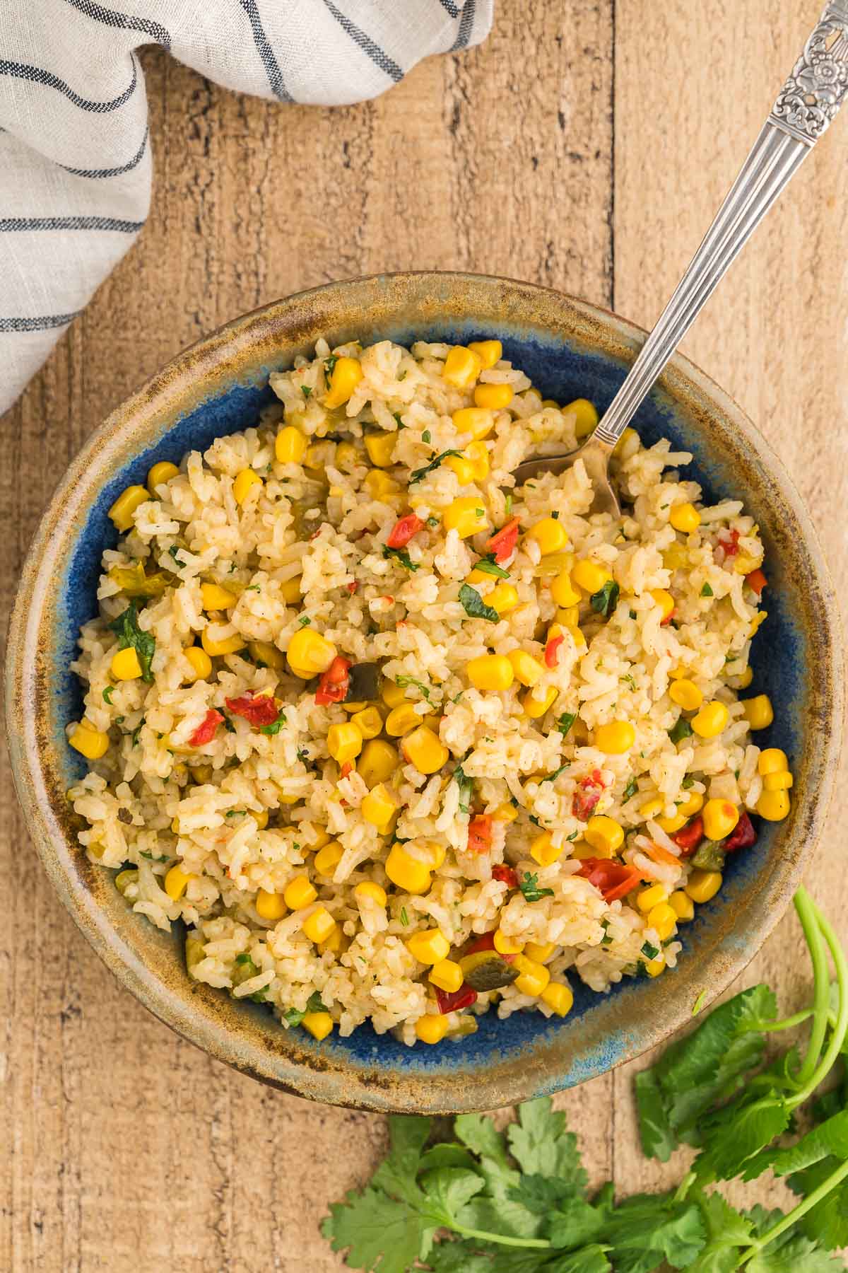 festive taco rice in a bowl with cilangro