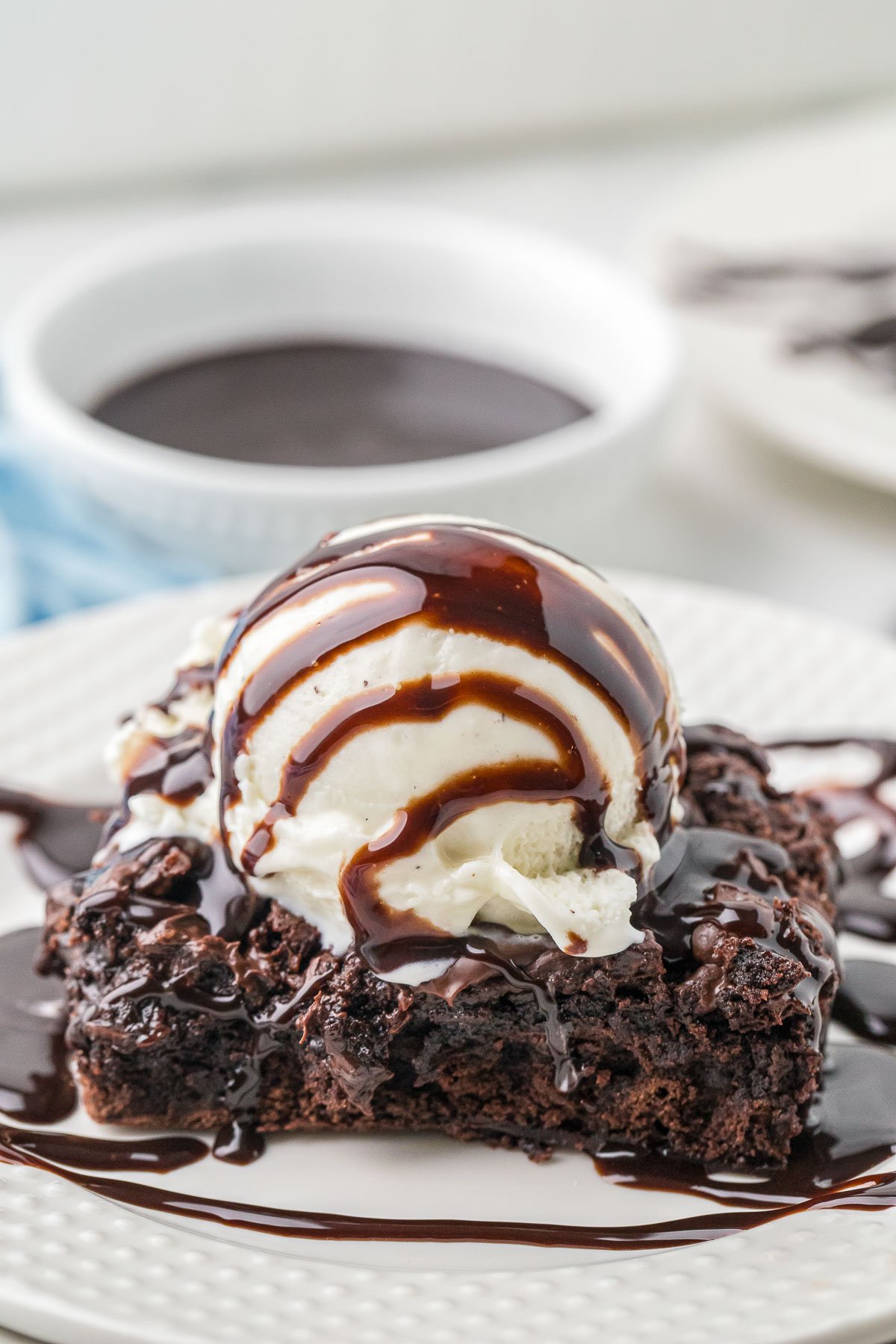 warm chocolate dessert scooped from the pan