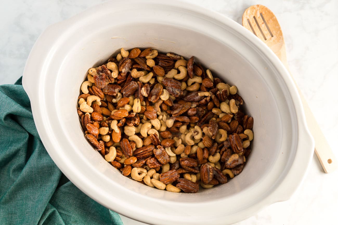 cashews, pecans, and almonds in a slow cooker