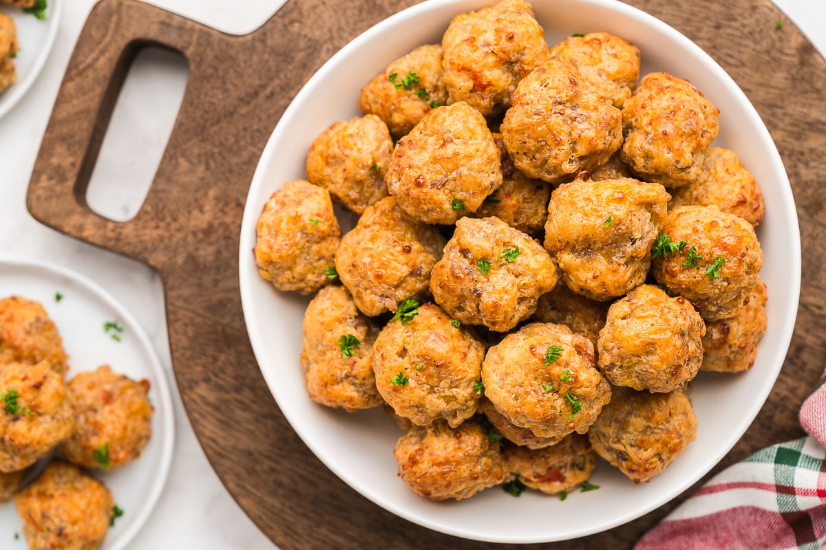 melted cheese and sausage bite on plate with crisp edges